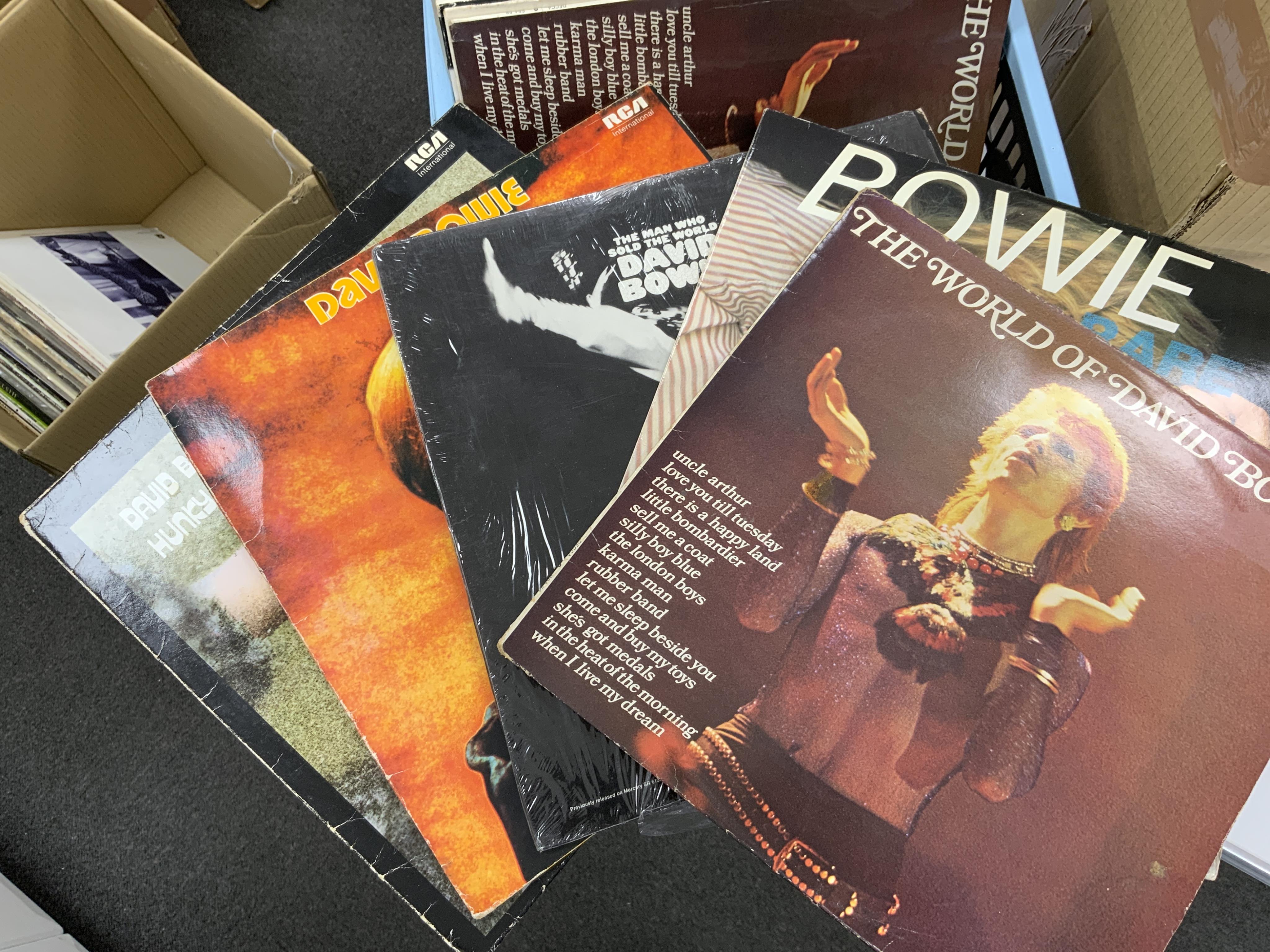 Ninety LP record albums, 12” and 7” singles, etc. artists including; David Bowie, Jimi Hendrix, the Beatles, AC/DC, Fleetwood Mac, Status Quo, etc. together with a number of duplicate issues of modern drum and bass etc i